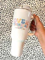 Pastel font that says overthinking is my super power on a white 40oz tumbler with a handle