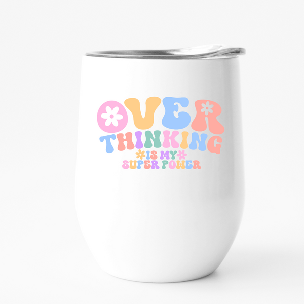 over thinking is my super power written in pastel font on a white wine tumbler