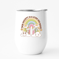 A pastel design with a rainbow, flowers, and the words your anxiety is a lying ass bitch on a white wine tumbler