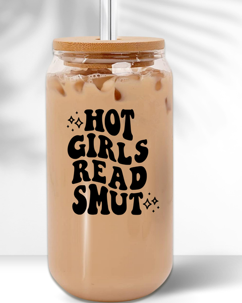 Glass tumbler with iced coffee and 'Hot Girls Read Smut' text on a white background