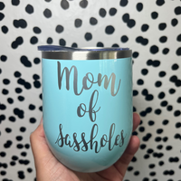 a seasfoam blue wine tumbler that says sasholes in silver