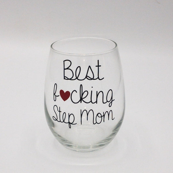 Black text that says best fucking stepmom on a stemless wine glass